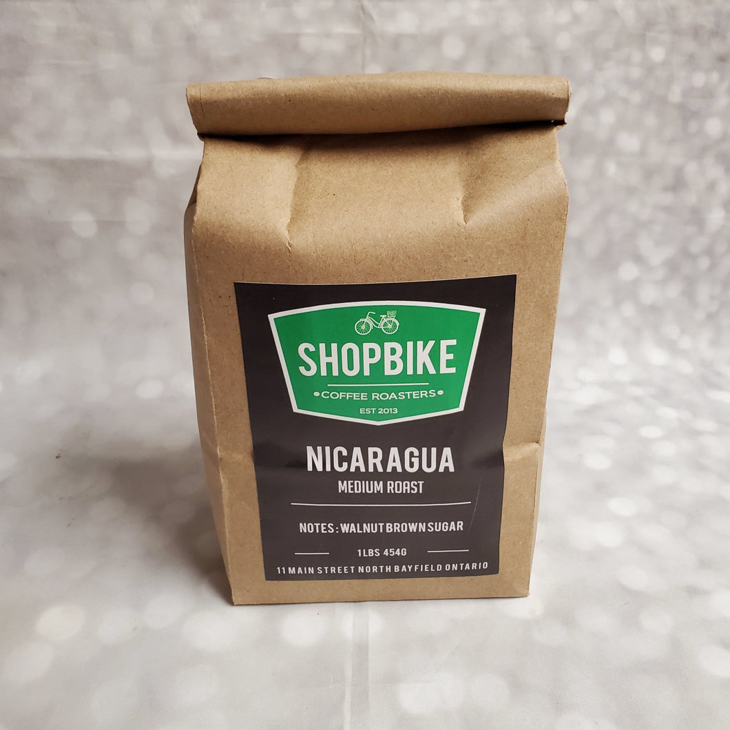 Shopbike Coffee | Nicaragua medium roast - My Other Child / Blooms n' Rooms